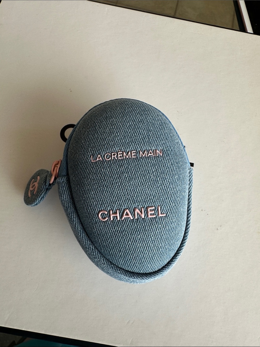 CHANEL La Crème Main Denim Pouch in Light Blue with Pink Accents